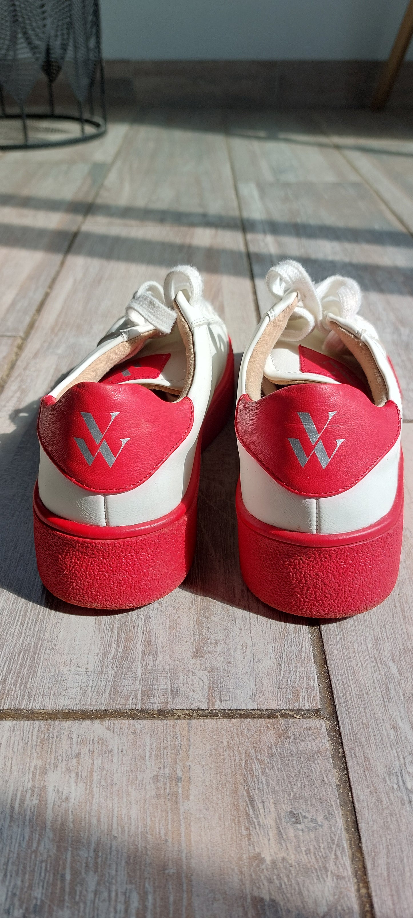 Red sole sneakers