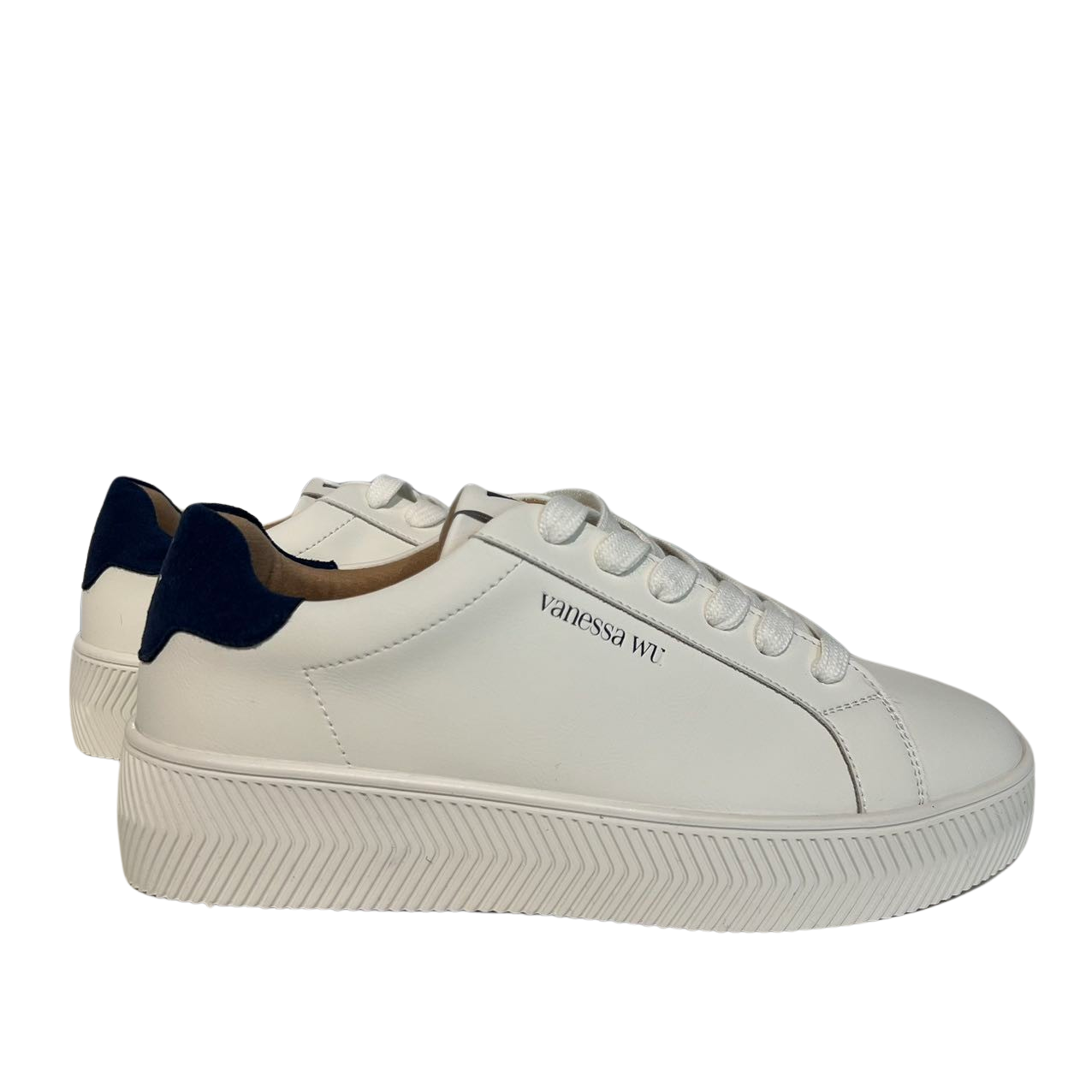 White and navy lace-up sneakers