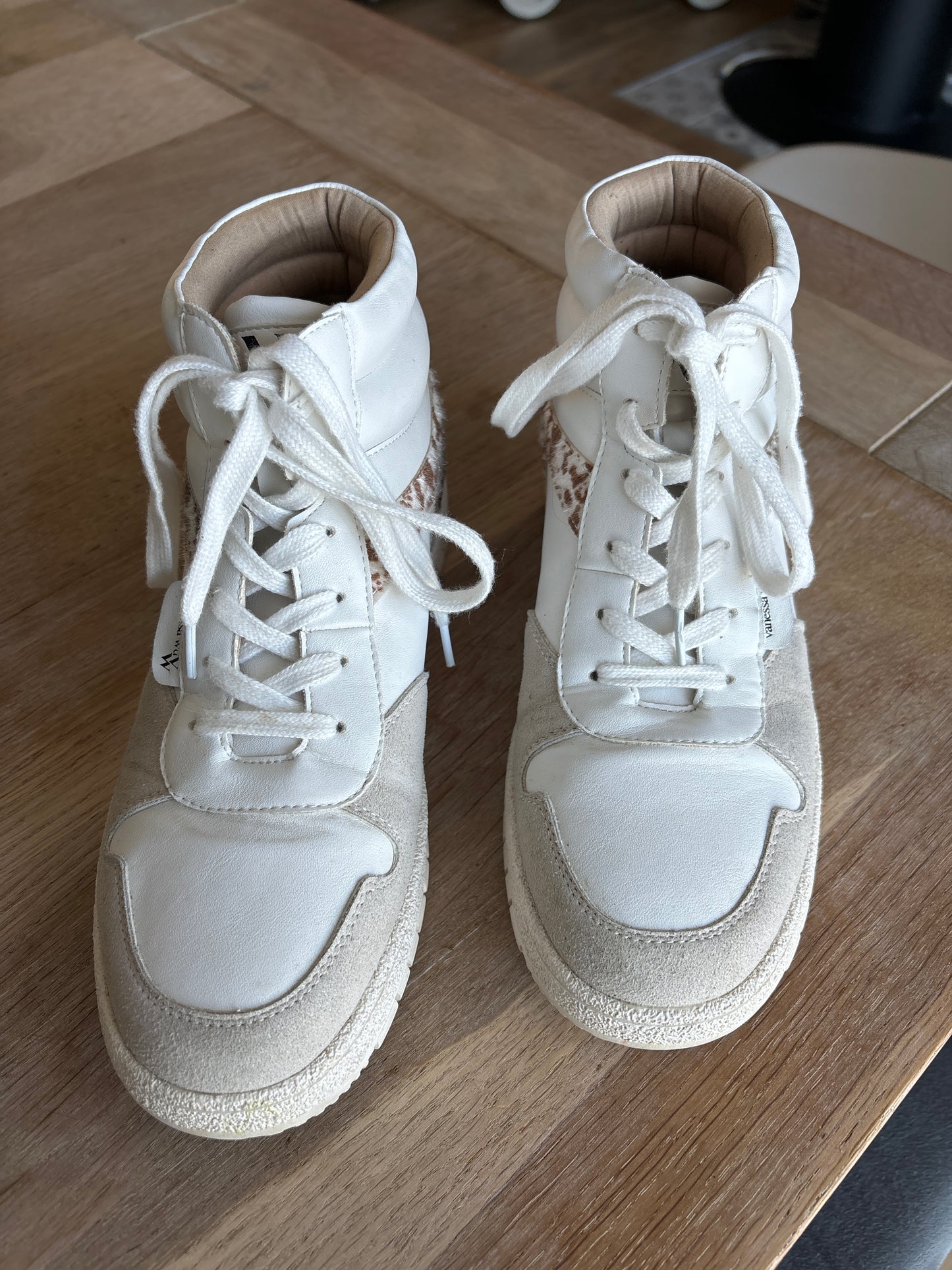 White Kassidy high-top sneakers with cow detail